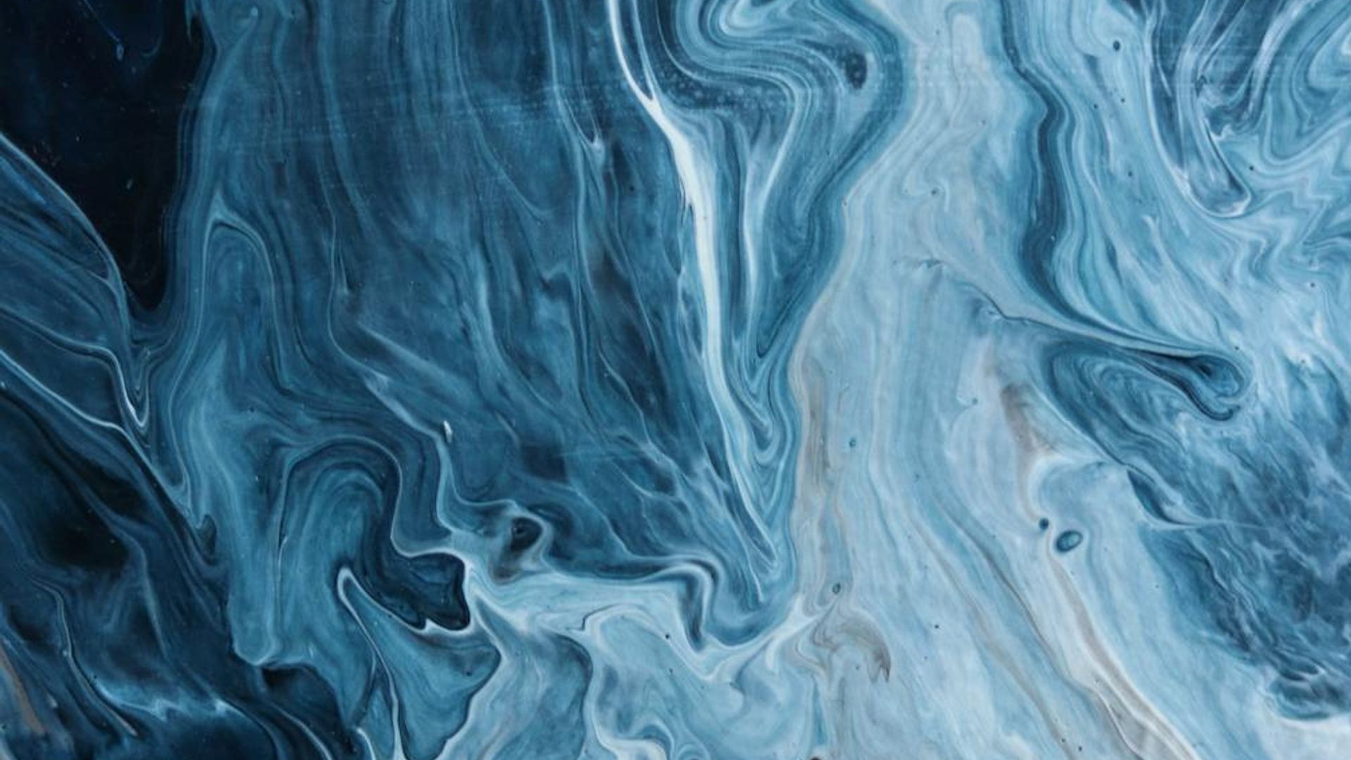 A serene abstract background with fluid lines suggesting calm movement.